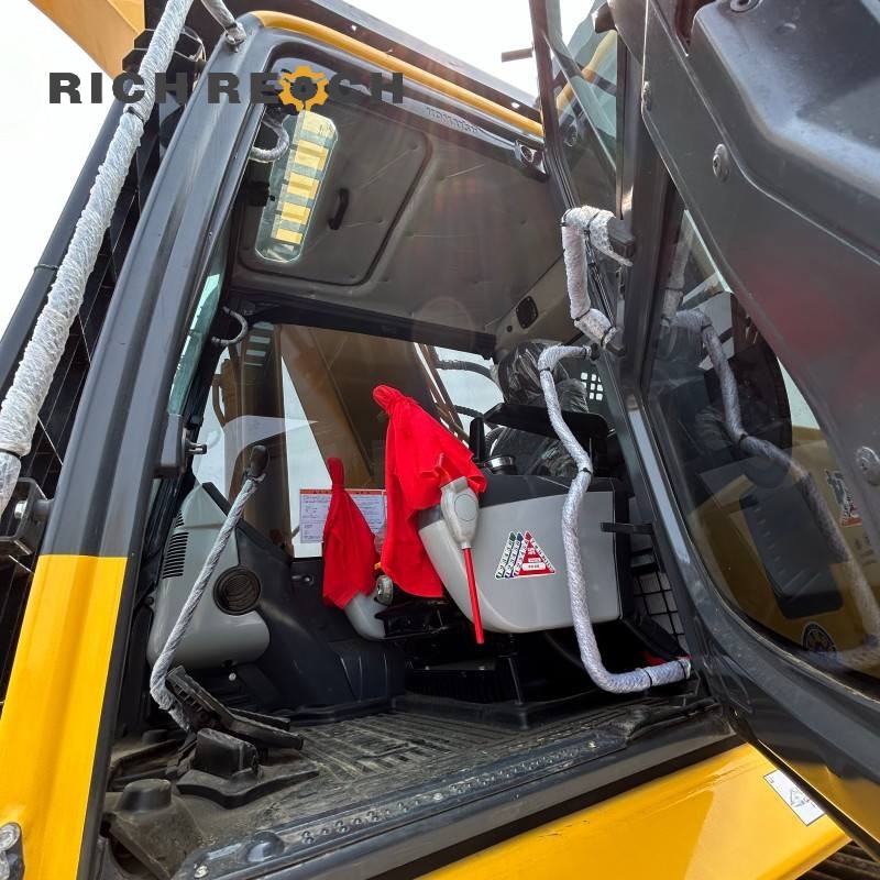 Large capacity rock bucket of a 2018 Komatsu PC350LC excavator with 4,600 hours, priced at $41,667